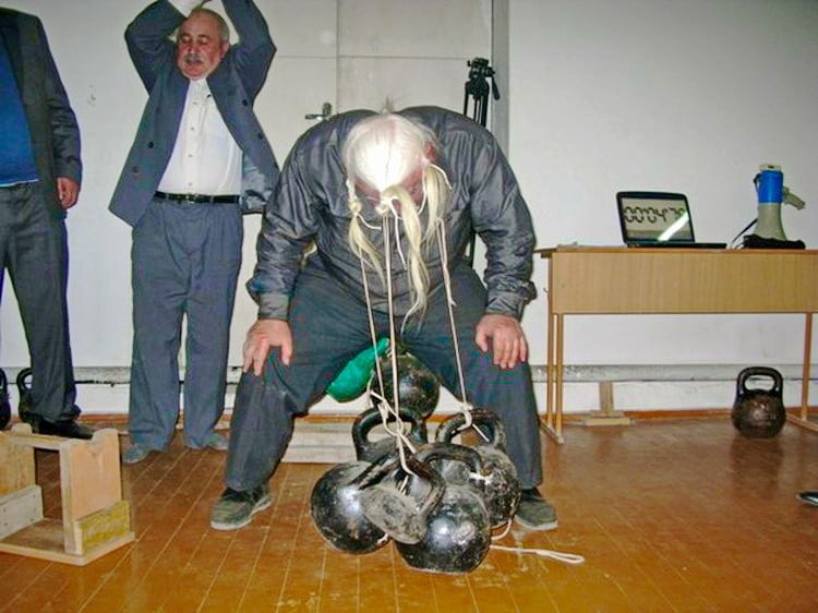Наибольший вес, поднятый волосами (мужчина)