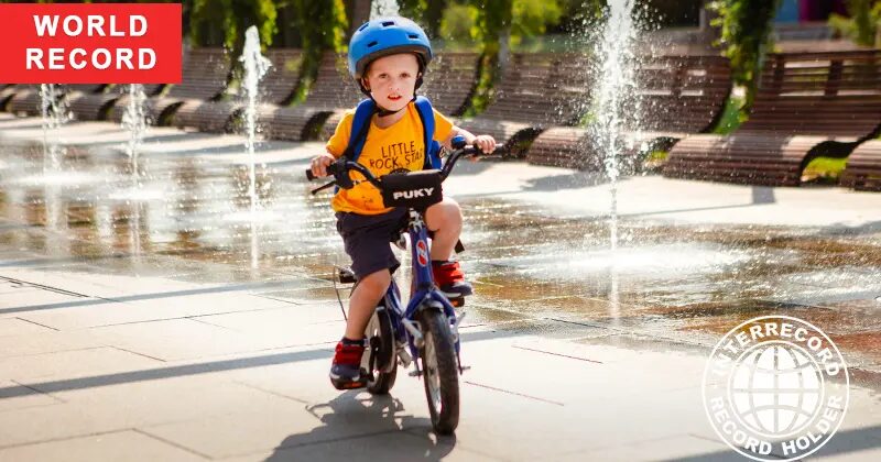 Youngest age for driving a two-wheeled bicycle without the use of auxiliary wheels | Книга рекордов INTERRECORD | World Record