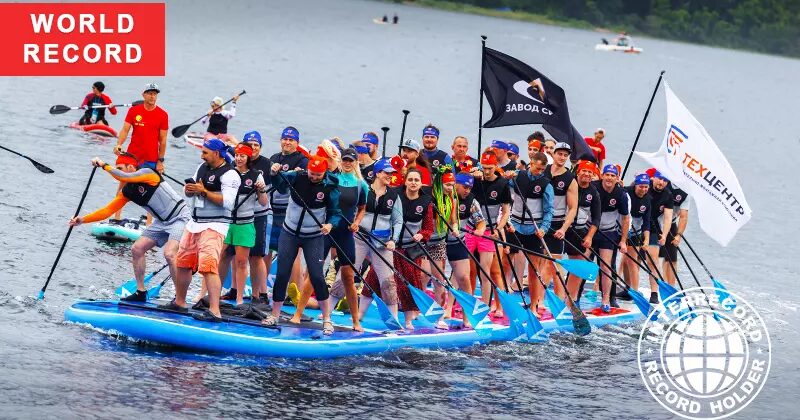 Most people paddled a stand up paddle surfboard (SUP) | Книга рекордов INTERRECORD | World Record