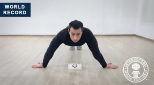 most push-ups on the backs of turned-out hands in one minute