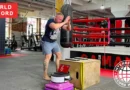 Dmitry Russkikh jumps onto sadhu board during nail fitness record