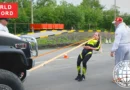 Liudmila Spirina pulling a 3105 kg Hummer H2 with her teeth