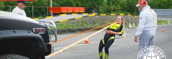 Liudmila Spirina pulling a 3105 kg Hummer H2 with her teeth