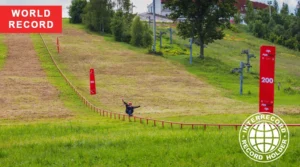 lya Savosin performing the world’s longest rail slide