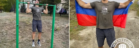 Alexey Getmanov performing record-breaking pull-ups